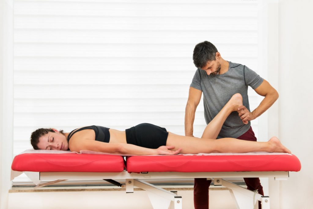 Osteopath doing a hamstring manipulation